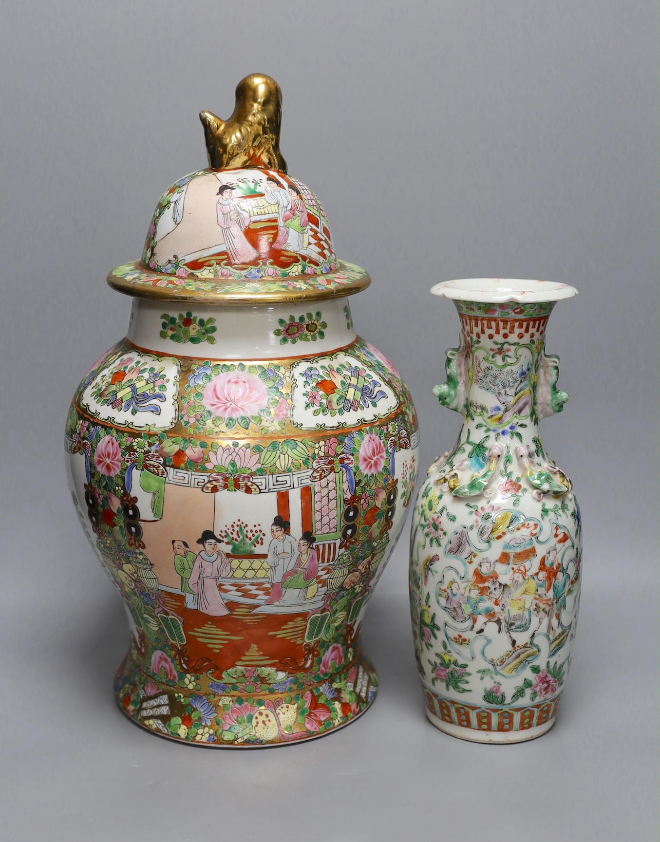 A 19th century Chinese famille rose vase and a later jar and cover, 19th century vase 30 cms high